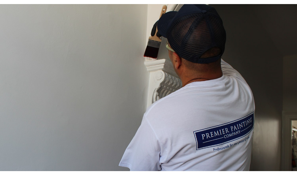 painter painting wall