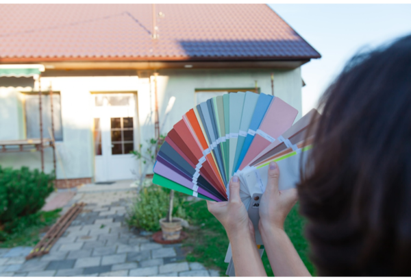 woman choosing colors for a new facade